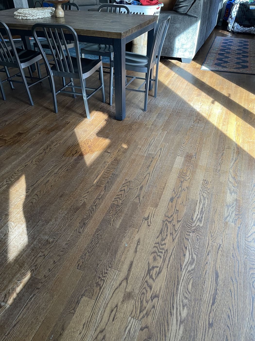 Family room hardwood floors before cleaning