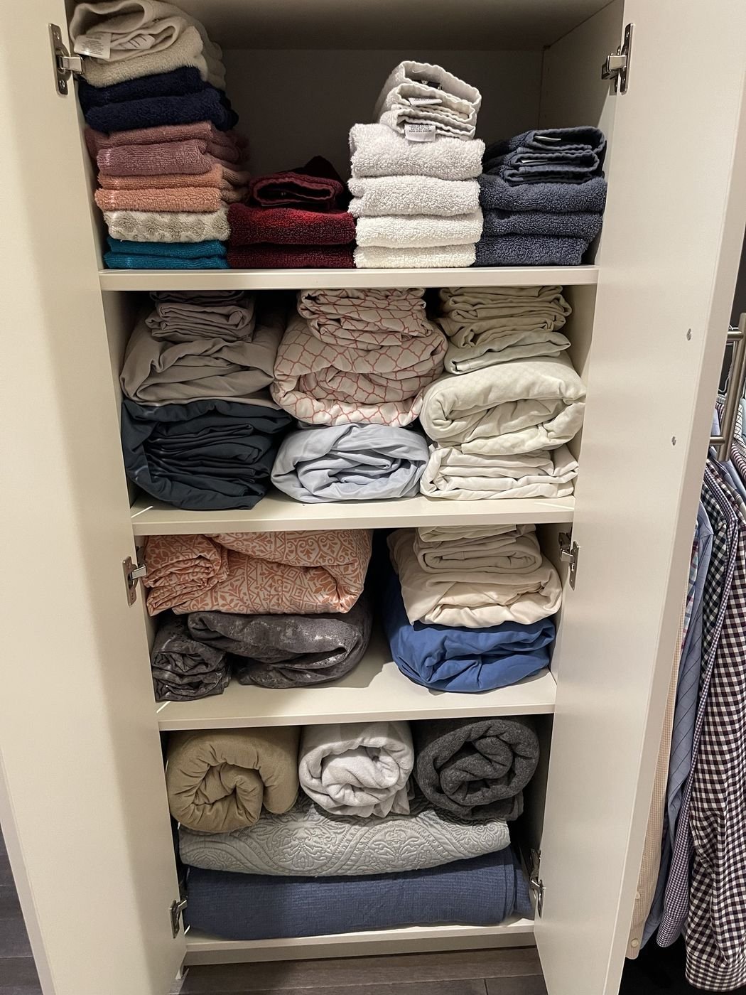 Linen closet folded and organized